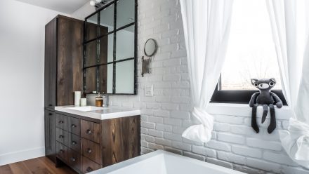 Modern bathroom design with bathtub and Italian-style shower.