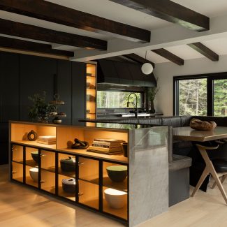 Modern kitchen with central island in spacious house.